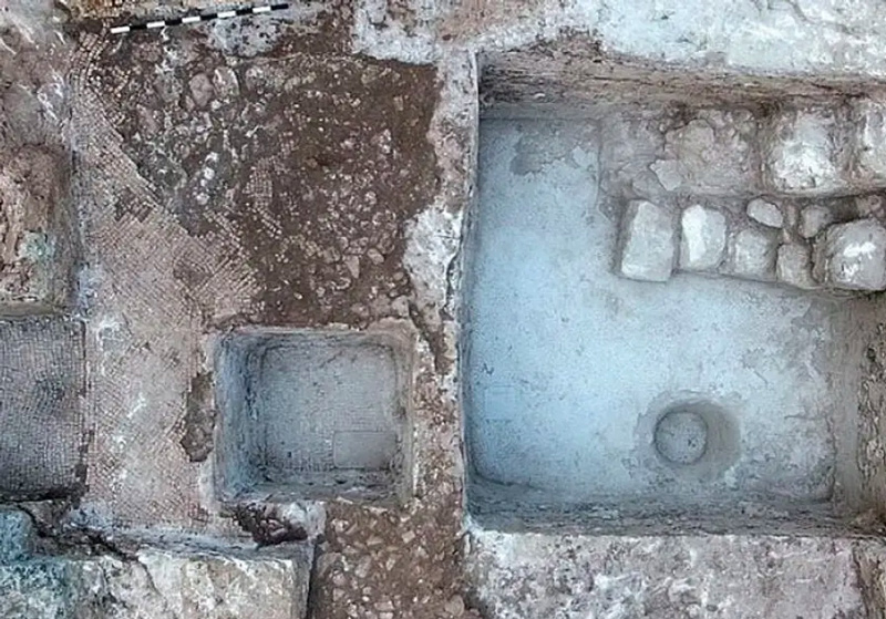 The ancient wine press and inscription uncovered at Tzur Natan.
