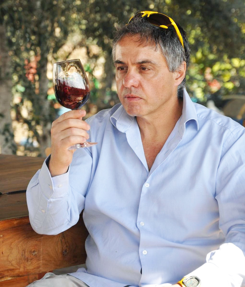 Prof. Oded Shoseyov sampling a product of his Bravdo winery