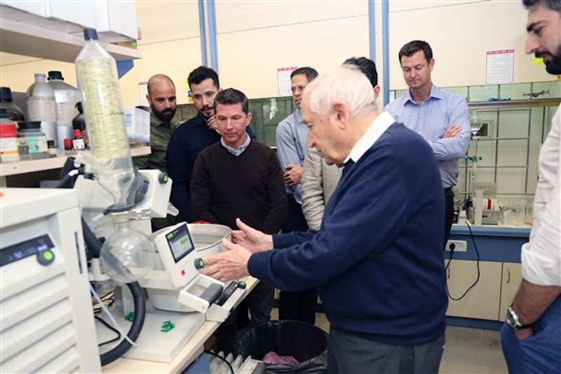Raphael Mechoulam explaining the steps of the synthesis of stable CBD acid at his lab at Hebrew University in Israel. Mechoulam was the first to synthesize THC and discovered the endocannabinoid system, leading to the nickname 
