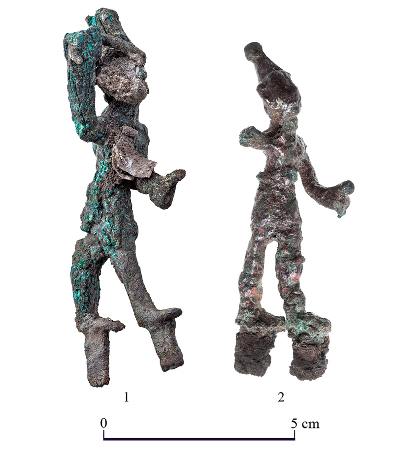 The two ‘smiting gods’ figurines / T Rogovski