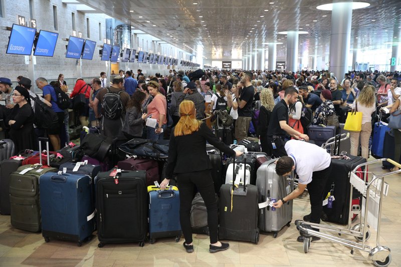 People waiting in the Departures hall at Ben Gurion Airport in pre-coronavirus times.