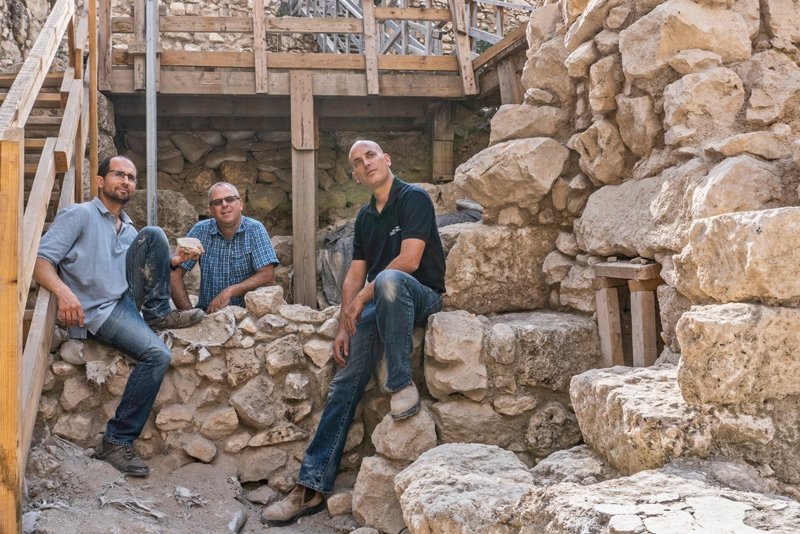 From left-right: TAU PhD student Yoav Vaknin, Prof. Yuval Gadot, IAA archaeologist Dr. Yiftach Shalev at the site where remnants of the 586 BCE destruction of Jerusalem by the Babylonians were discovered in the City of David Park in Jerusalem.
