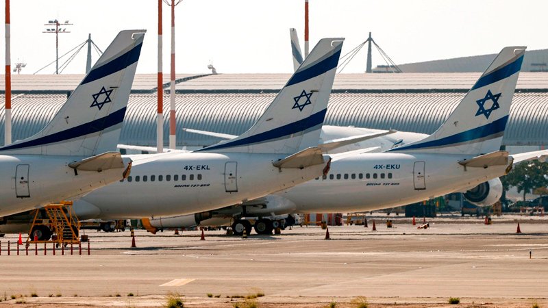 Airliners belonging to El Al, Israel’s national carrier, stand idle on the tarmac at Ben-Gurion Airport on August 3.