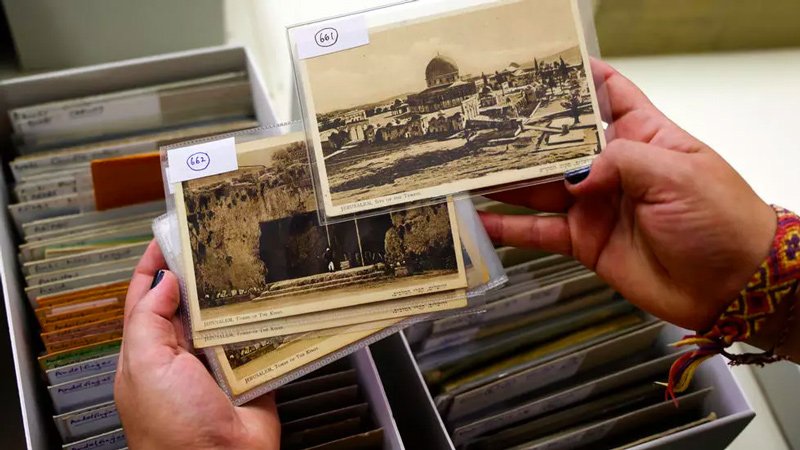 The postcards -- categorised in shoeboxes in Pearlman's garage and accumulating to the point where he had to park his car on the street -- were given to the Hebrew University's Folklore Research Center.