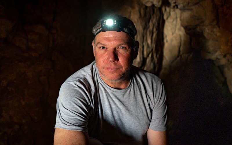 Hebrew University researcher Oren Gutfeld inside Cave 52 at the Qumran archaeological site.