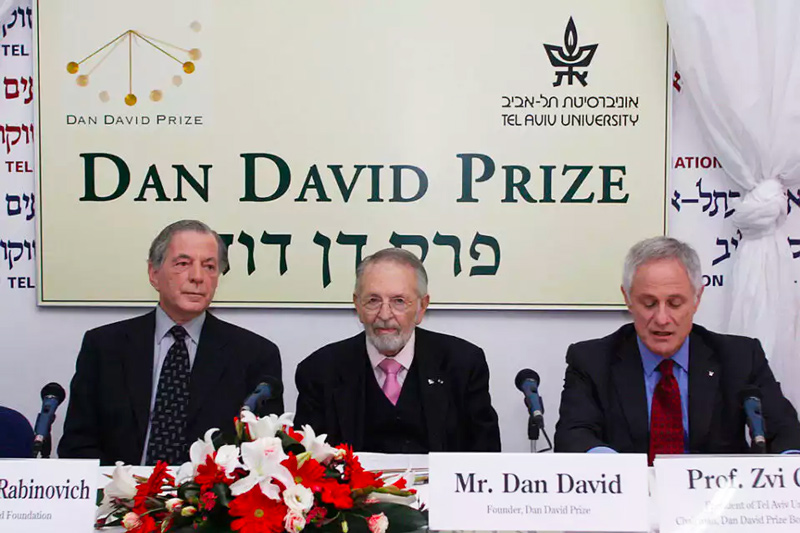 Dan David, center, founder of the The Dan David Prize